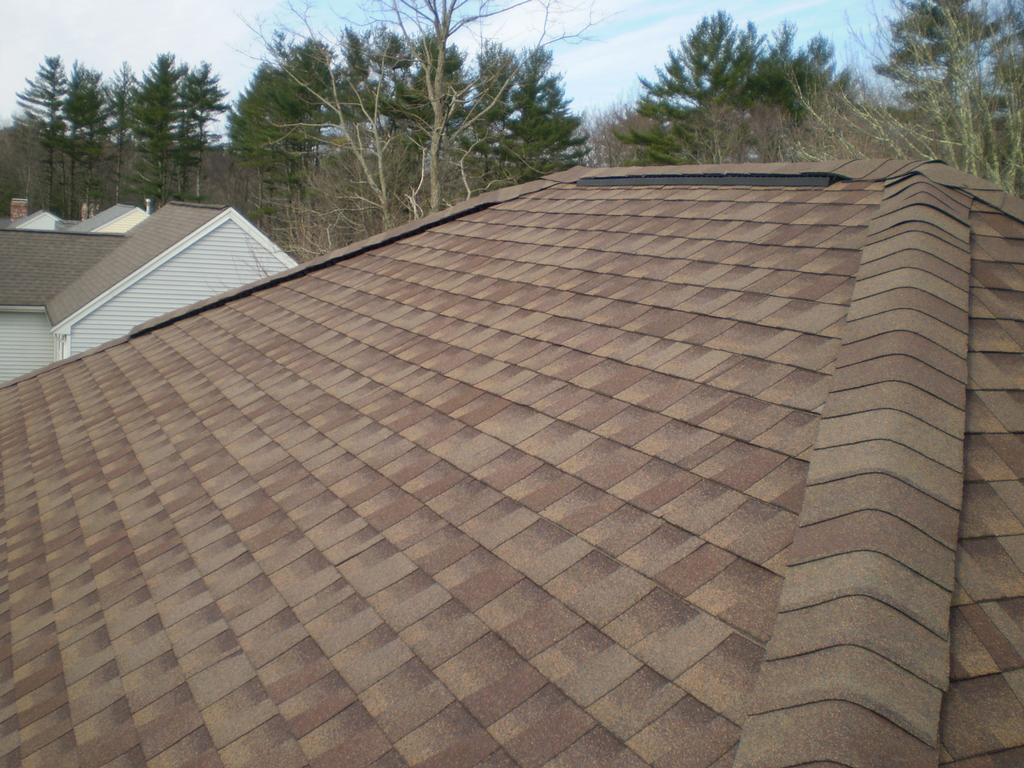 The upper roof w/ a Hip Master vents applied to all four hip ridges