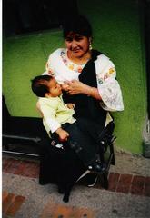 Nursing mom and toddler in Otavalo, Ecuador by Breastfeeding Support Home Visits, Amanda Stuart Grand Rapids 49509 
