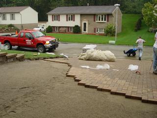 Laying Omni-Stone Pavers One At A Time by BORRASSO LANDSCAPING  *1977* ~ Maria A. Borrasso, Owner         Pittsburgh 15239 