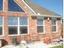 reflective brick house.jpeg