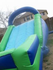 front view of dry slide by AROUND WE BOUNCE PARTY  RENTALS San Antonio 78245 