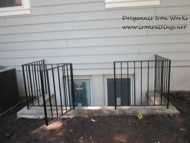 Window well railing with gate (iron) by Delyannis Iron Works