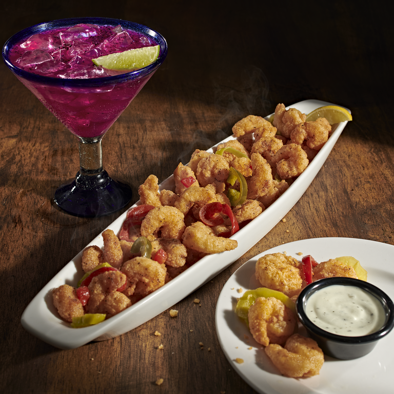 Start off your night with our Patron Dragon Fruit Margarita featuring our specially blended for LongHorn Patron Reposado Tequila, dragon fruit, pineapple, and all-natural sweet & sour. by LongHorn Steakhouse