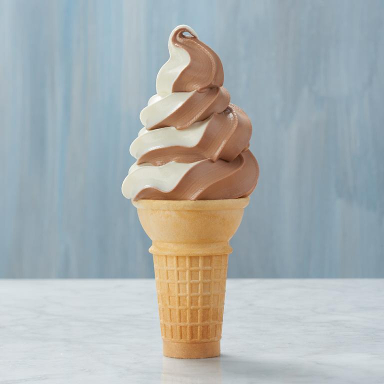 Classic cone filled with chocolate vanilla swirl soft-serve ice cream. by Rally's