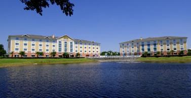 HEH ext. Both Buildings cropped by Holiday Inn Express Hotel & Suites at Summer Bay Resort