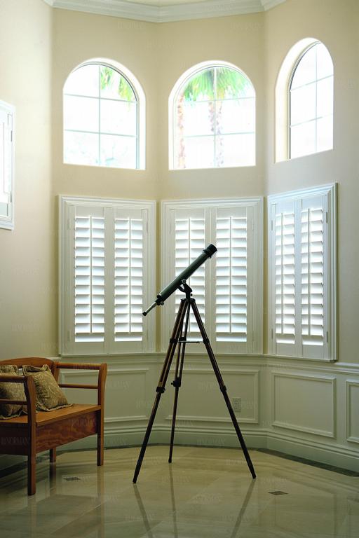 White Woodlore Shutters by U S Verticals Manufacturing Incorporated