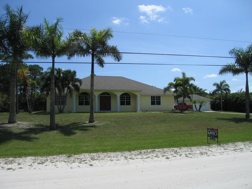 Front 3 by RE/MAX Ocean Properties John Christopher & Vickie Meyer