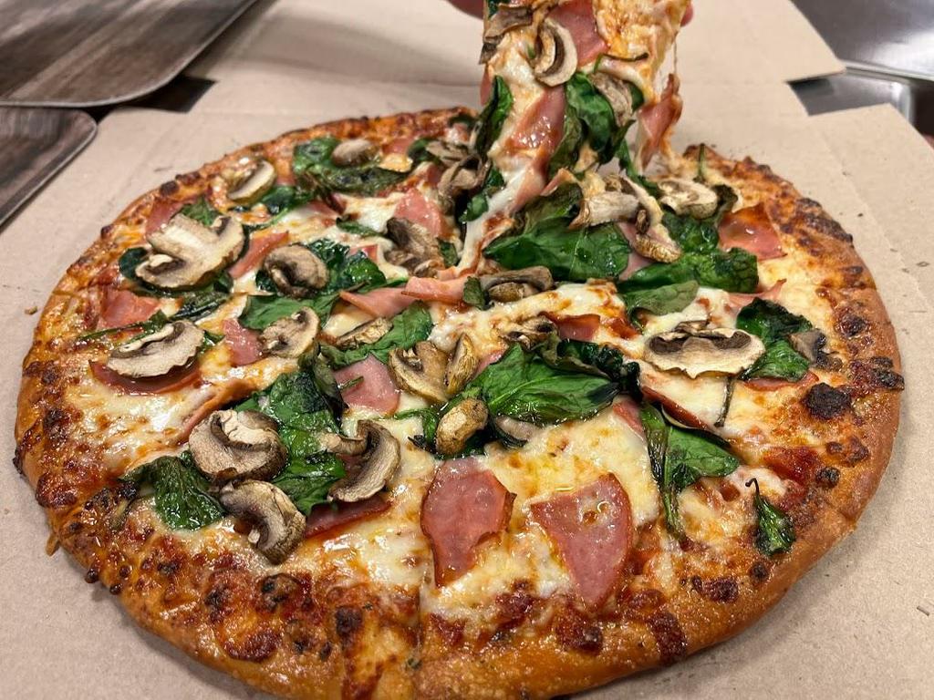  by Domino's Pizza