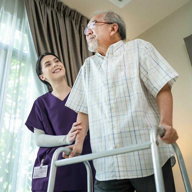 Nurse with hospice patient. by VITAS Healthcare