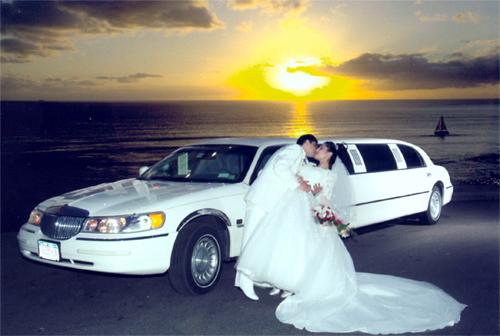 WhiteLimoWeddingatSunset by Showcase Limousines