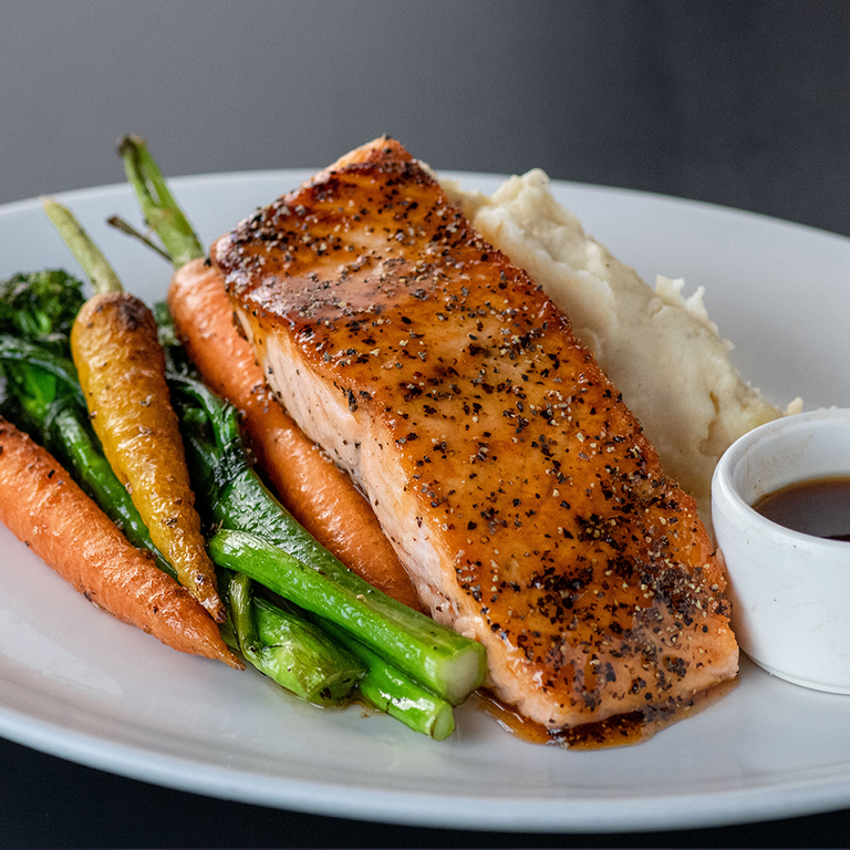Yard House offers a variety of seafood options, such as the Whiskey Glazed Salmon. by Yard House