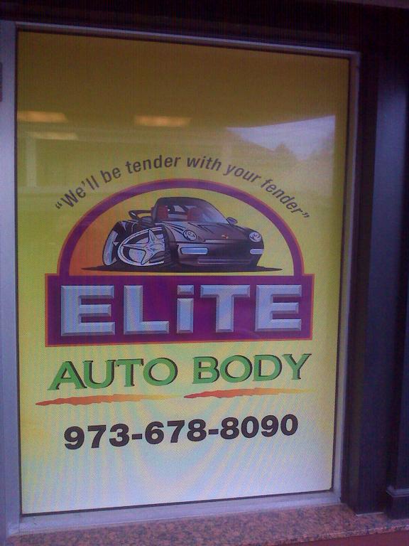 Glass perforated wrap by Artistic Signs llc
