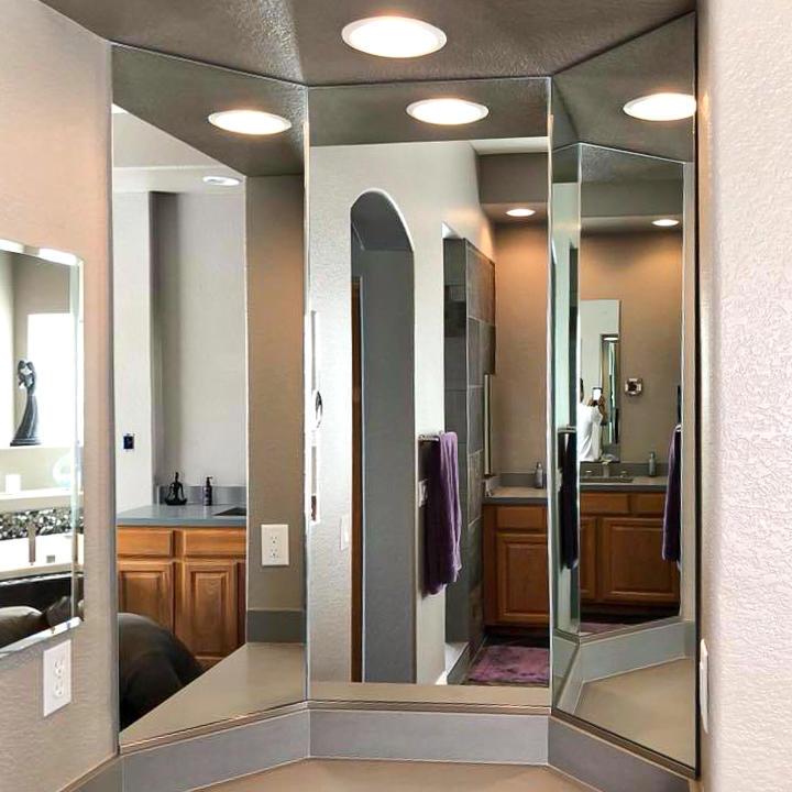 Vanity Bathroom Mirror Installed to make the room look more open and appealing! Measured and installed by Cut Rate Glass. by Cut Rate Glass