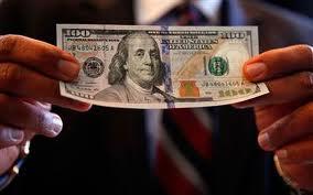 $100 in hand by Total Merchant Services