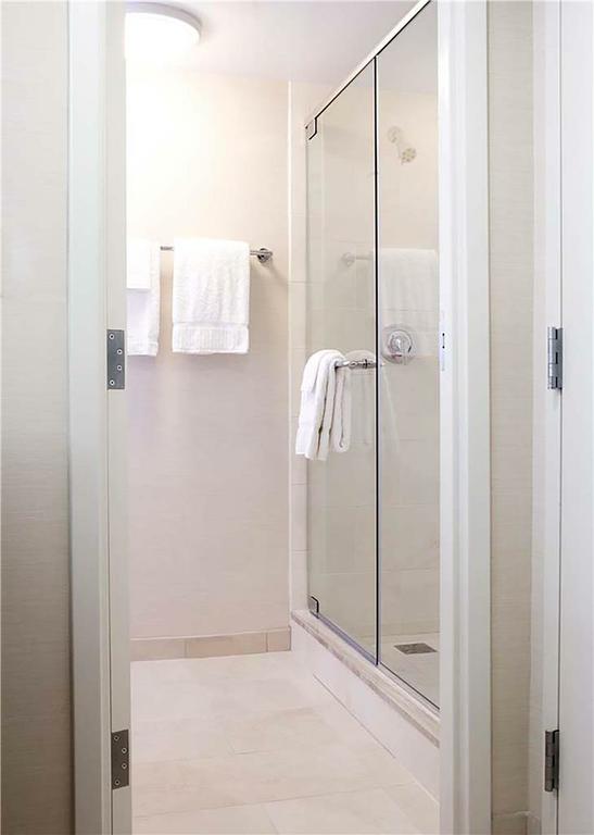 Guest room bath by Hilton Orlando Buena Vista Palace - Disney Springs Area
