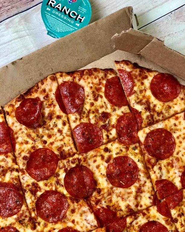  by Domino's Pizza
