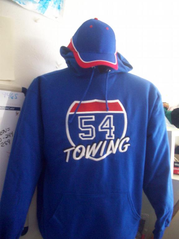 logo 54 by Embroidered Vision