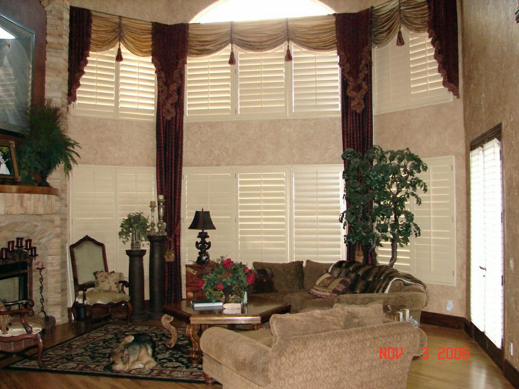 Tassel Tied Pull-ups, Cascades and Panels over Custom Shutters by Visions Decorating Incorporated