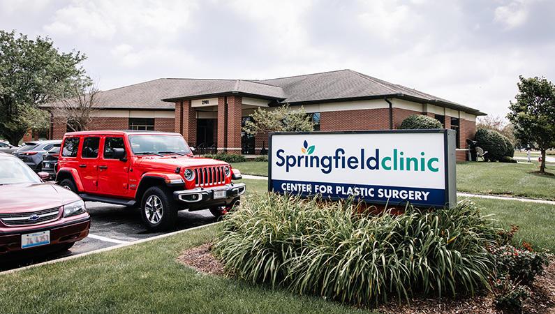 Exterior signage of single-story brick medical office building in Springfield, Illinois. by Springfield Clinic Center for Plastic Surgery
