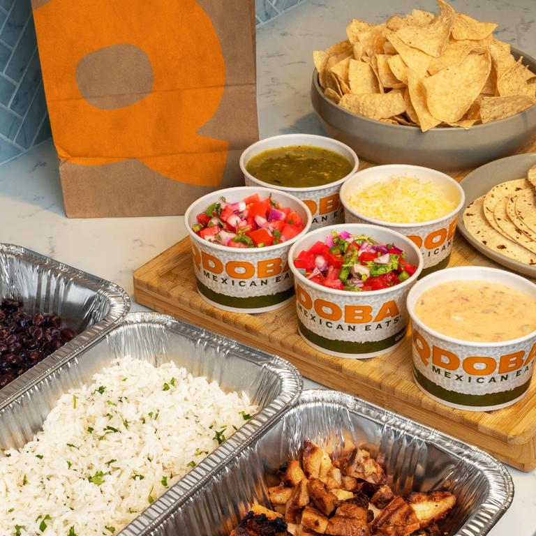 Family Meals come with all of the fixings to make flavorful tacos or bowls for 4-5 people. by QDOBA Mexican Eats
