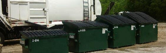 row of dumpsters by Dumpster Man of Orange County