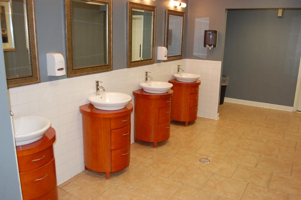 mens room in lobby by Bricktown Hotel & Convention Center