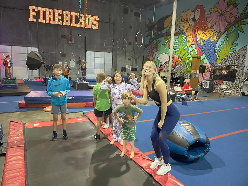 Gymnastics and tumbling class on the tumble track near the spring floor. by The Jungle Movement Academy