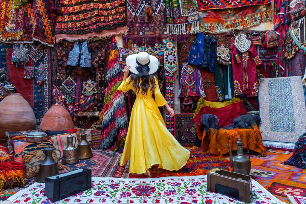 beautiful-girl-traditional-carpet-shop-goreme-city-cappadocia-turkey by Vintage Rugs