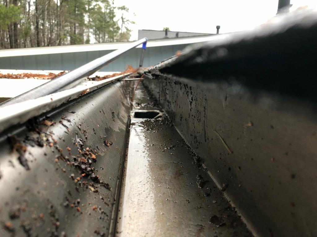 by Guru Gutter Cleaning Greensboro