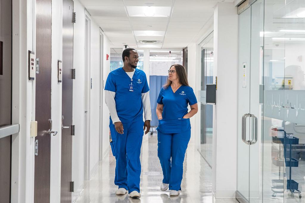 Nursing college students on campus at Arizona College of Nursing. by Arizona College of Nursing - Aurora