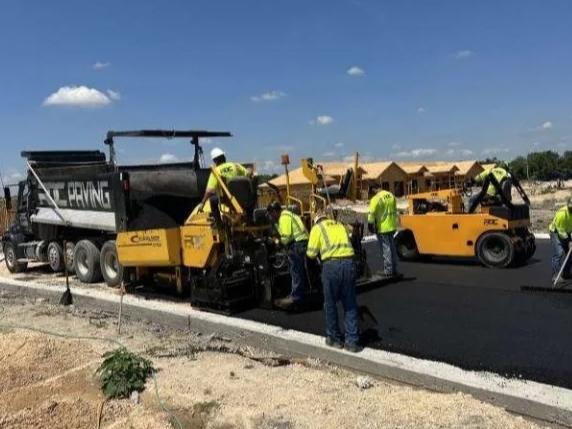 RDC Paving working on asphalt road construction by RDC Paving LLC