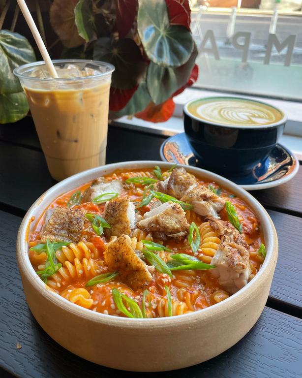 A unique fusion dish from our Downtown Brooklyn kitchen, our spicy Gochujang chicken vodka fusilli pasta is served alongside a signature specialty iced latte. by White Noise Coffee - Coffee Shop & Roastery