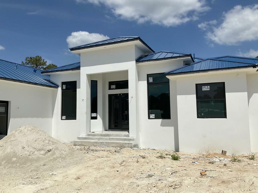  by Real and Builders Corp