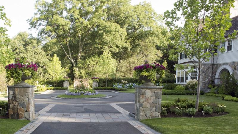 We create beautiful, personalized landscape designs. by Ferre Landscaping & Exterior Management
