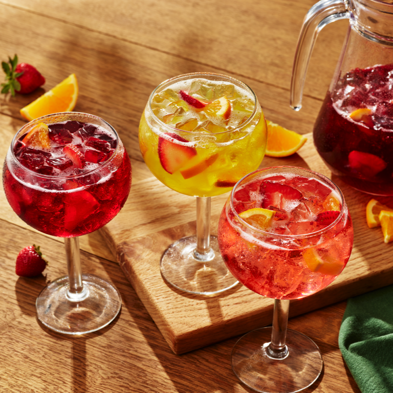 Sangrias: Made with a blend of chilled wine, fresh fruit and a splash of fruit juices. by Olive Garden Italian Restaurant