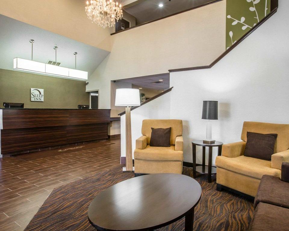 Relax in the open space lobby with clublounge seating from Sleep Inn