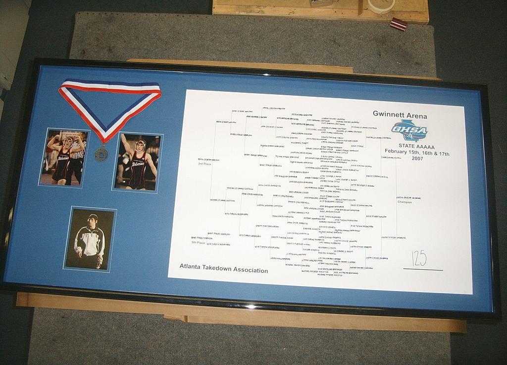 Wrestling shadowbox from Scandinavian Custom Framing in McDonough, GA 30253