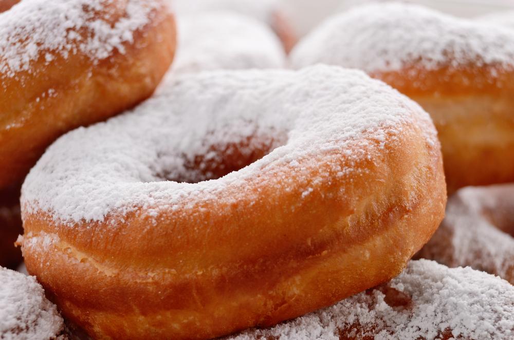 Powdered sugar crusty donuts
